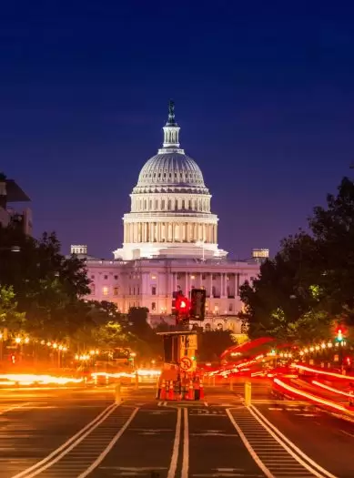 Washington, DC at night, where Tom practiced tax law for 18 years
