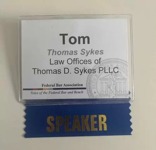 Thomas D. Sykes speaking as a Federal Bar Association panelist